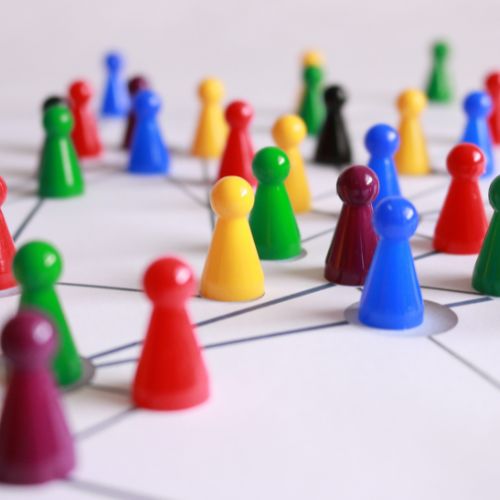 colourful pins on a white background