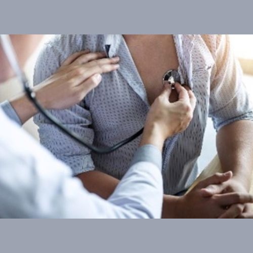 healthcare professional checking the heart condition of a patient with a stethoscope
