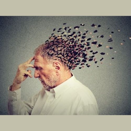 A man turned to the side with his hand over his head with a graphic showing pieces of his head breaking off from the back