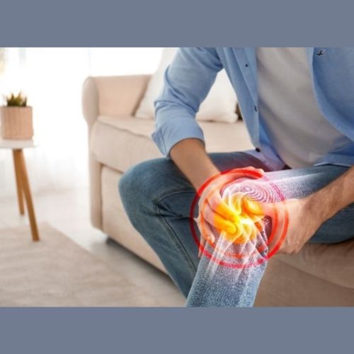 image of a man clutching his knee, different colour on the knee joint to indicate pain