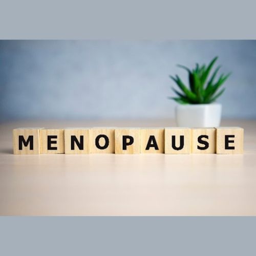 the word menopause made with wooden alphabet blocks