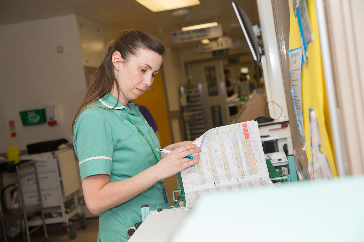 Healthcare professional entering patient notes