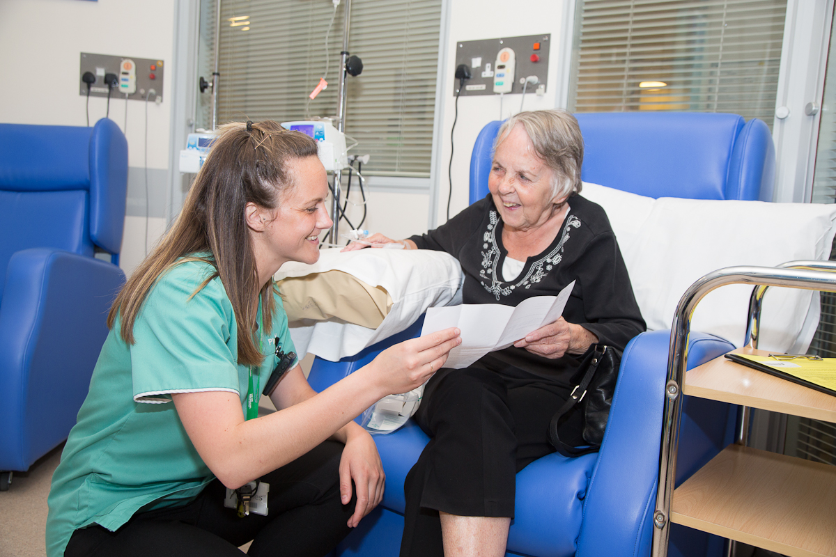 A healthcare professional with patient