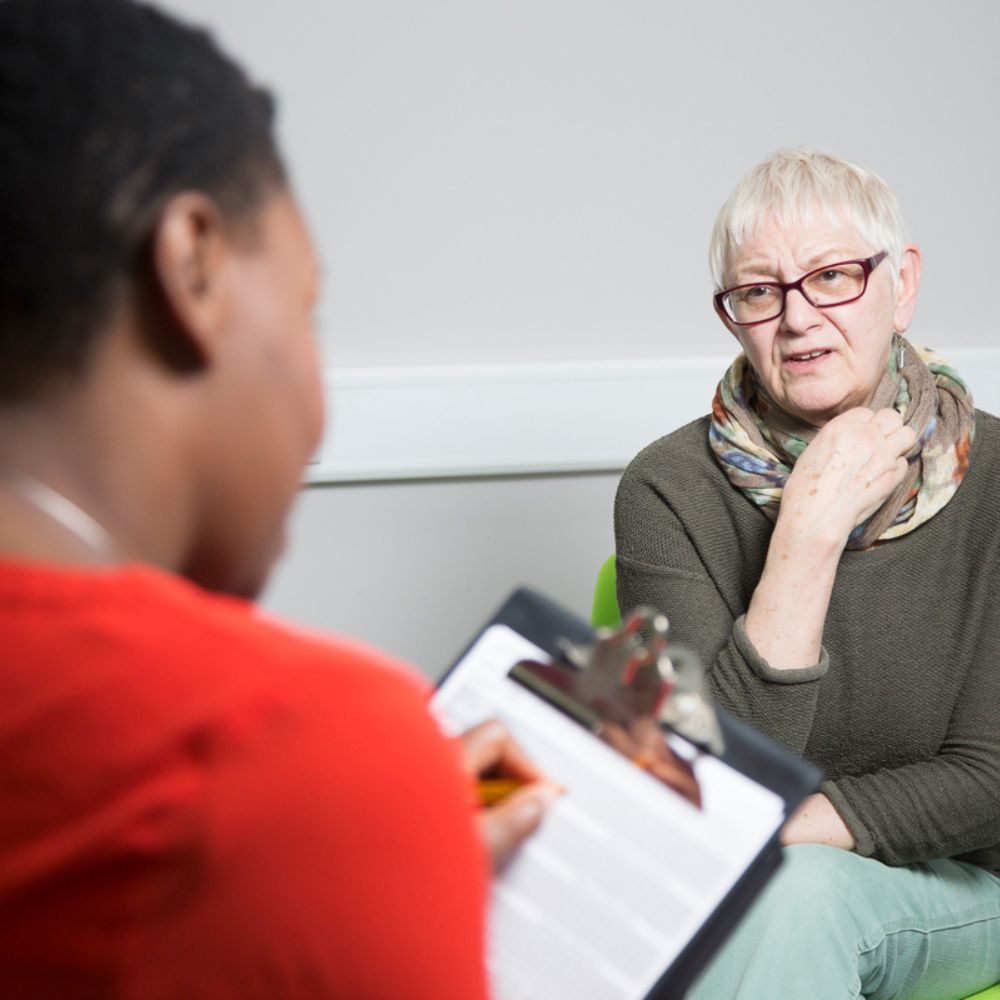 Patient in consultation with a healthcare professional